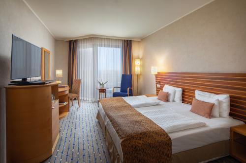 Podwójna sypialnia Hotelu Greenfield Bukfurdo - Wellness, romantyzm, przyjemność na Węgrzech