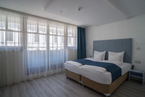 Boutique Hotel Civitas - superior dubbelsäng i innerstad av Sopron