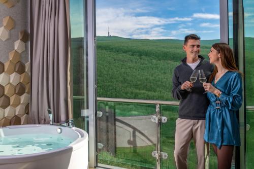 Luxe en elegante hotelkamer met jacuzzi in Hotel Residence Ozon