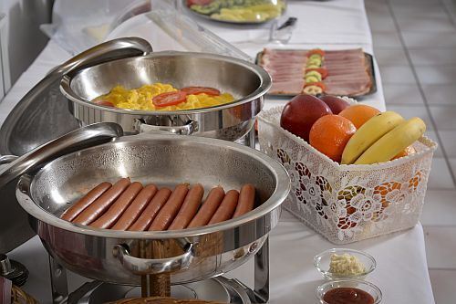 Chambre de petit-déjeuner de l'Hôtel Budai - l'hôtel 3 étoiles sur le côté de Buda de Budapest